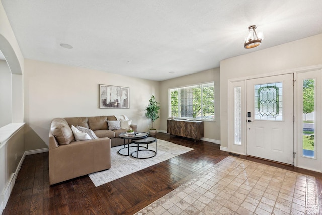 14318 S Butterfield Park Way, Herriman, UT 84096 - living room featuring hardwood / wood-style flooring and arched walkways