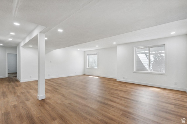 14318 S Butterfield Park Way, Herriman, UT 84096 - basement with wood finished floors and recessed lighting