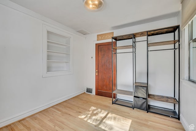 1252 E Bryan Ave S, Salt Lake City, UT 84105 - unfurnished bedroom with light wood-type flooring and a closet