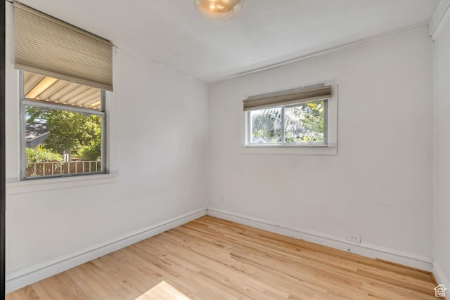1252 E Bryan Ave S, Salt Lake City, UT 84105 - empty room with wood finished floors