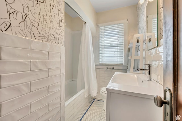 1252 E Bryan Ave S, Salt Lake City, UT 84105 - full bath with shower / bath combination with curtain, vanity, tile walls, and tile patterned floors