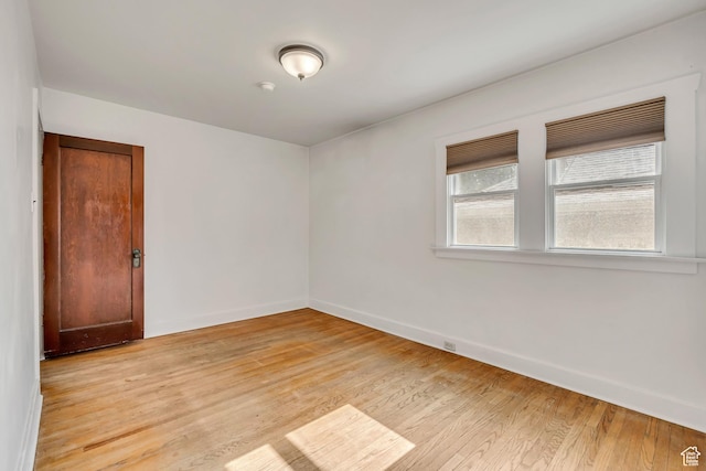 1252 E Bryan Ave S, Salt Lake City, UT 84105 - unfurnished room with light wood-style flooring and baseboards