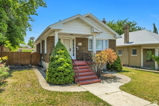 1252 E Bryan Ave S, Salt Lake City, UT 84105 - bungalow-style house with a chimney and brick siding