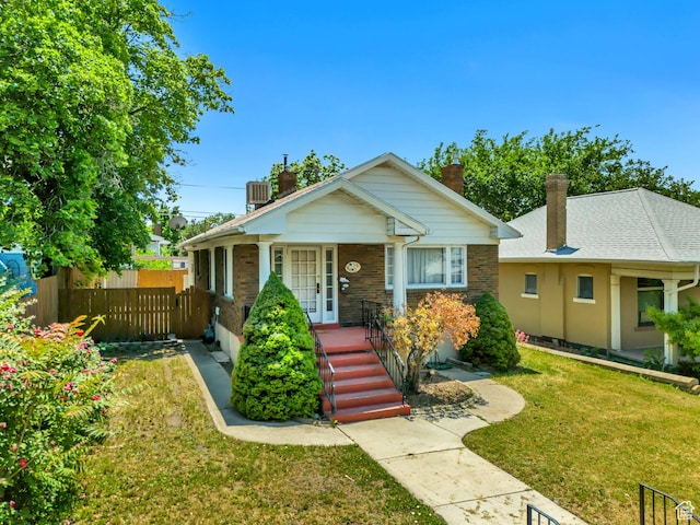 1252 E Bryan Ave S, Salt Lake City, UT 84105 - bungalow-style home with a chimney and covered porch