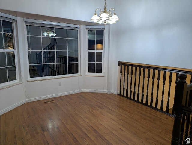 2826 W 4275 S, Roy, UT 84067 - empty room featuring a chandelier and wood finished floors