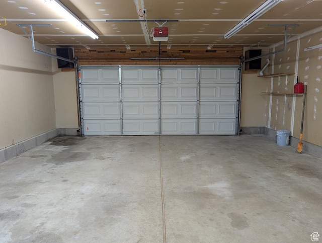 2826 W 4275 S, Roy, UT 84067 - garage featuring a garage door opener