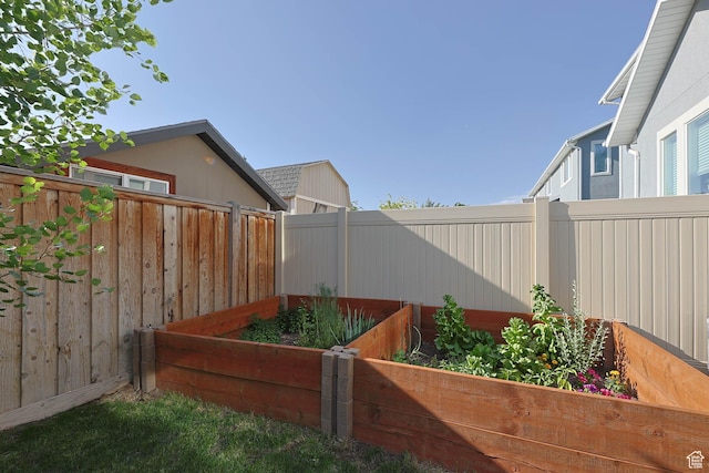 8151 St Cecilia St S, Eagle Mountain, UT 84005 - fenced backyard with a vegetable garden