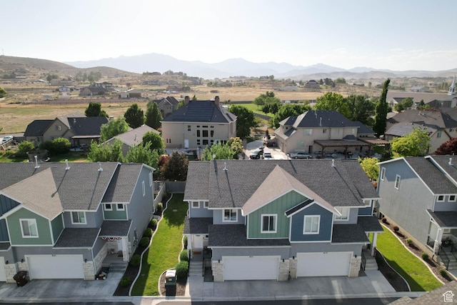 8151 St Cecilia St S, Eagle Mountain, UT 84005 - aerial perspective of suburban area featuring a mountainous background