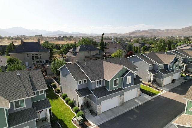 8151 St Cecilia St S, Eagle Mountain, UT 84005 - aerial perspective of suburban area with a mountainous background