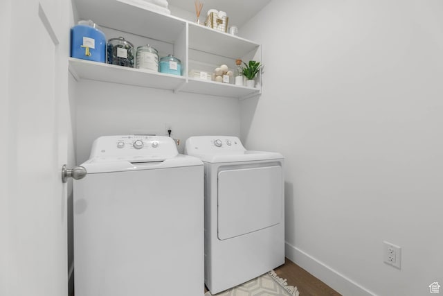 8151 St Cecilia St S, Eagle Mountain, UT 84005 - laundry area featuring washer and dryer and wood finished floors