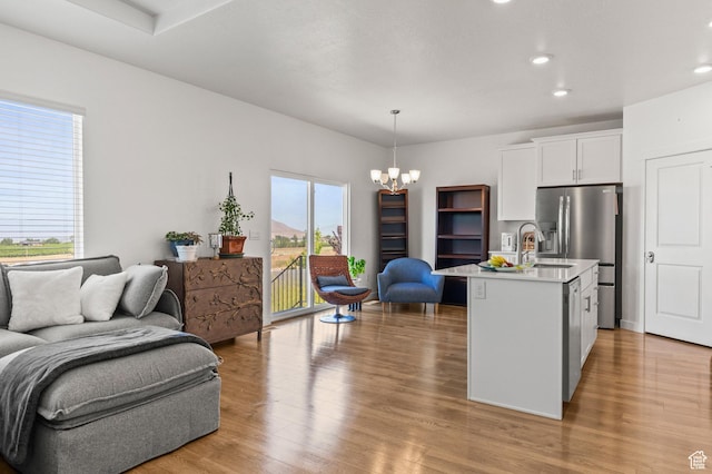 1268 S Raintree Ln, Santaquin, UT 84655 - living area with a chandelier, light wood-type flooring, and recessed lighting