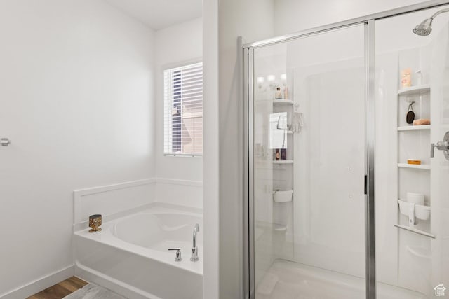1268 S Raintree Ln, Santaquin, UT 84655 - full bath featuring a shower stall, a garden tub, and wood finished floors