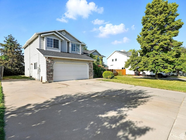 1213 W 1640 N, Clinton, UT 84015 - traditional home featuring driveway and an attached garage