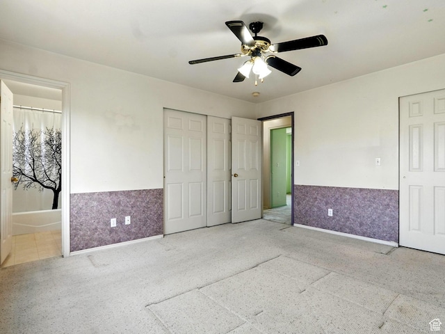 1213 W 1640 N, Clinton, UT 84015 - unfurnished bedroom with wainscoting, ensuite bath, ceiling fan, and a closet