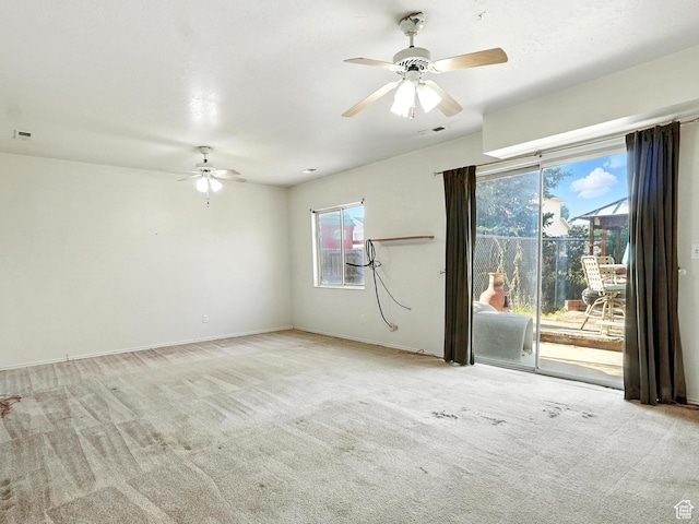 1213 W 1640 N, Clinton, UT 84015 - spare room with a ceiling fan and carpet flooring