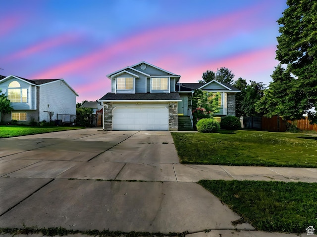1213 W 1640 N, Clinton, UT 84015 - traditional-style home with driveway, stone siding, and an attached garage