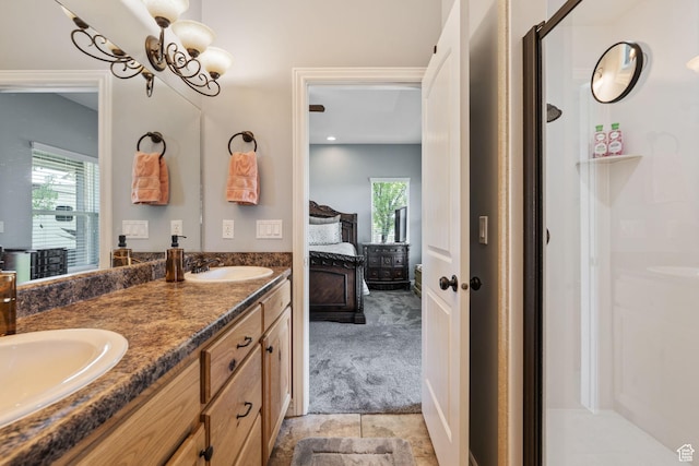 6613 W 200 N, Ogden, UT 84404 - ensuite bathroom featuring double vanity, a shower stall, and a chandelier
