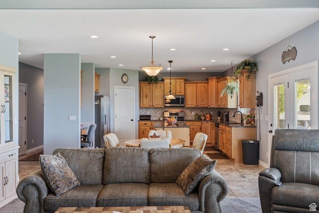 6613 W 200 N, Ogden, UT 84404 - living room with recessed lighting and baseboards