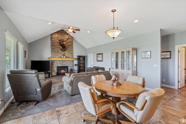 6613 W 200 N, Ogden, UT 84404 - dining room featuring ceiling fan, lofted ceiling, a fireplace, light tile patterned floors, and recessed lighting