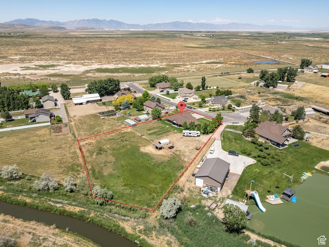 6613 W 200 N, Ogden, UT 84404 - aerial view of sparsely populated area featuring property parcel outlined and mountains