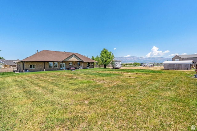 6613 W 200 N, Ogden, UT 84404 - view of grassy yard with a mountain view