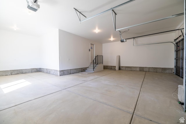 361 E Ventura Blvd, Tooele, UT 84074 - garage featuring a garage door opener