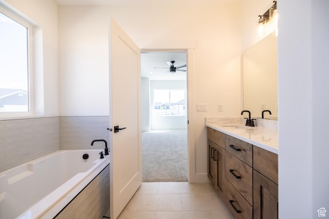 361 E Ventura Blvd, Tooele, UT 84074 - full bathroom with vanity, a bath, tile patterned flooring, and a ceiling fan