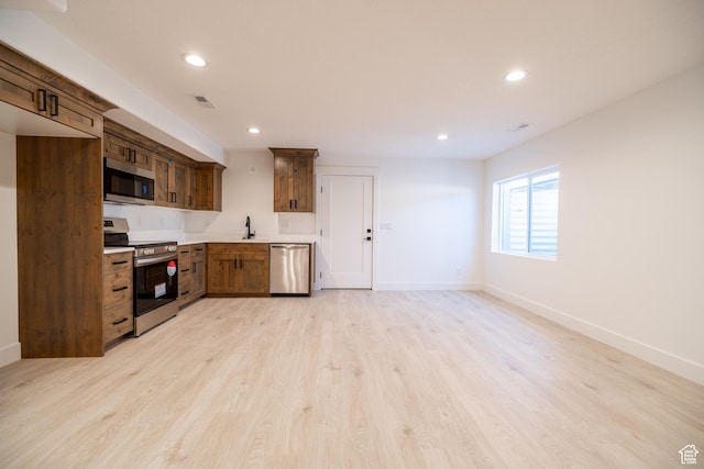 361 E Ventura Blvd, Tooele, UT 84074 - kitchen featuring appliances with stainless steel finishes, recessed lighting, light countertops, and light wood-style flooring