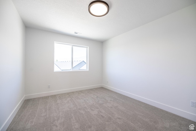 361 E Ventura Blvd, Tooele, UT 84074 - unfurnished room featuring light carpet and baseboards