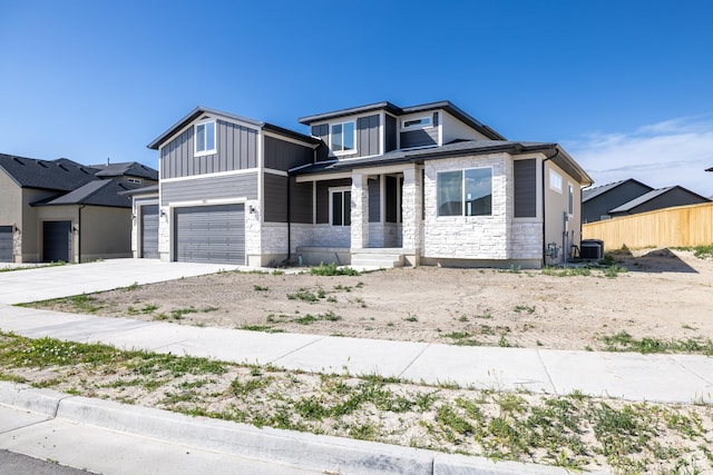 361 E Ventura Blvd, Tooele, UT 84074 - view of front of home featuring stone siding and driveway