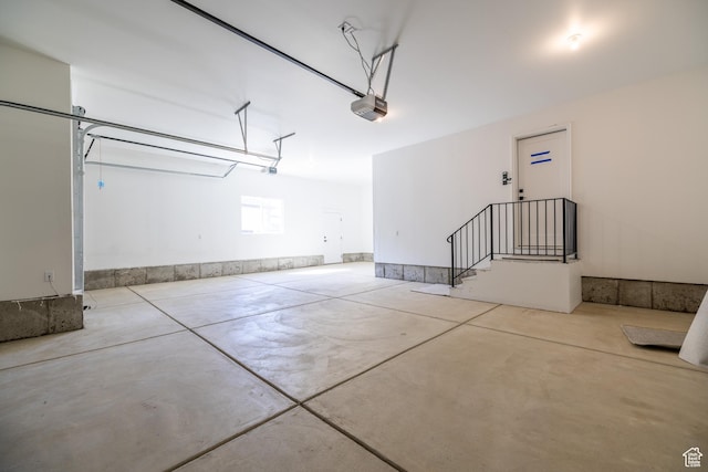 361 E Ventura Blvd, Tooele, UT 84074 - garage featuring a garage door opener