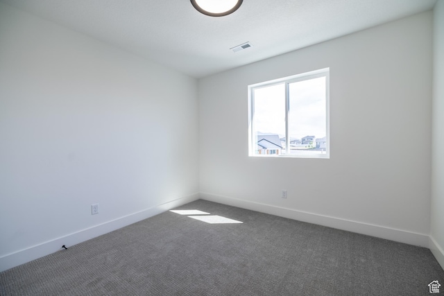 361 E Ventura Blvd, Tooele, UT 84074 - unfurnished room featuring carpet floors and baseboards