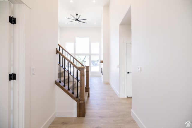 361 E Ventura Blvd, Tooele, UT 84074 - hall with light wood finished floors, stairs, and recessed lighting