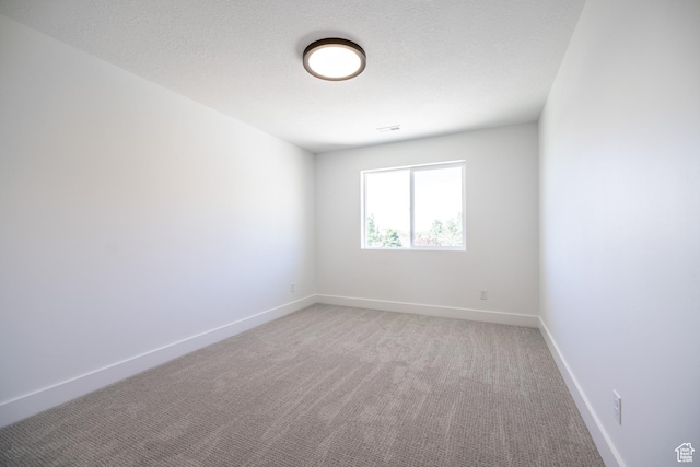 361 E Ventura Blvd, Tooele, UT 84074 - spare room featuring light colored carpet and baseboards