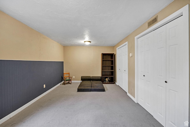 345 E 2475 N, North Logan, UT 84341 - exercise area with carpet and a textured ceiling