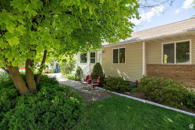 345 E 2475 N, North Logan, UT 84341 - view of front of property with brick siding and roof with shingles