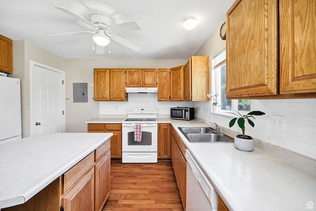 345 E 2475 N, North Logan, UT 84341 - kitchen with white appliances, electric panel, under cabinet range hood, and light countertops