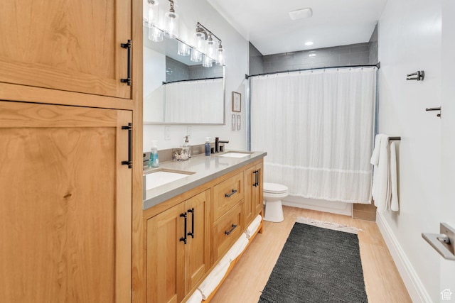 953 E 1000 N, American Fork, UT 84003 - bathroom with double vanity, wood finished floors, and shower / tub combo