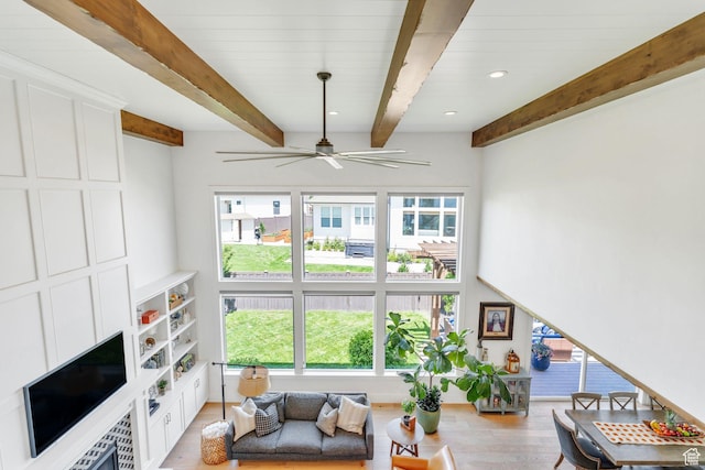 953 E 1000 N, American Fork, UT 84003 - living area with beamed ceiling, light wood-style flooring, healthy amount of natural light, a ceiling fan, and recessed lighting