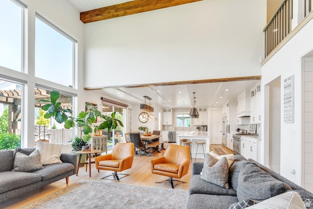 953 E 1000 N, American Fork, UT 84003 - living room with a high ceiling, light wood-type flooring, beam ceiling, and recessed lighting