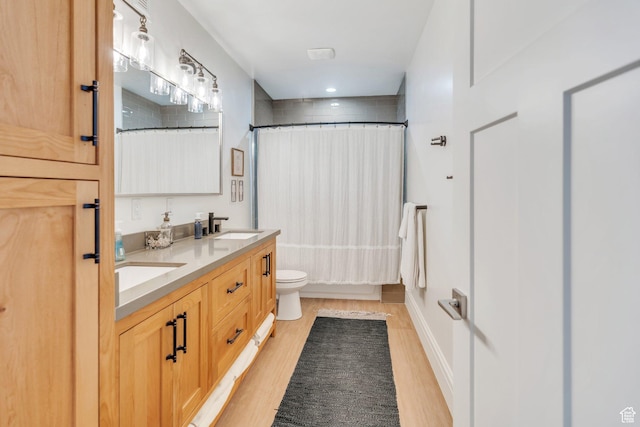 953 E 1000 N, American Fork, UT 84003 - full bathroom with wood finished floors, double vanity, and shower / tub combo