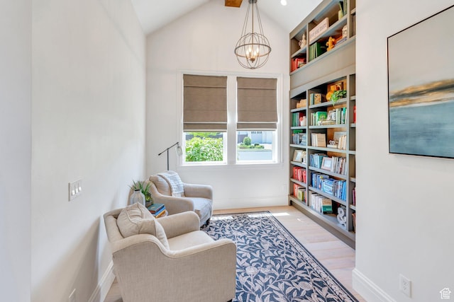 953 E 1000 N, American Fork, UT 84003 - sitting room featuring a chandelier, light wood finished floors, vaulted ceiling, and built in features