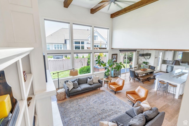 953 E 1000 N, American Fork, UT 84003 - living area featuring a high ceiling, a ceiling fan, beam ceiling, and wood finished floors