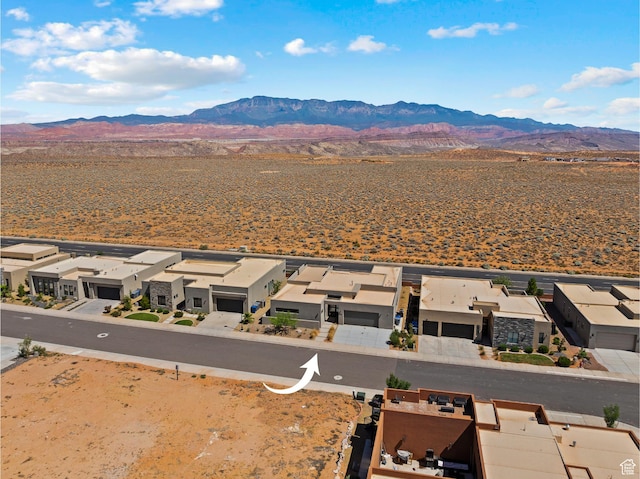 4982 W 3175 S, Hurricane, UT 84737 - aerial view of residential area with a mountainous background