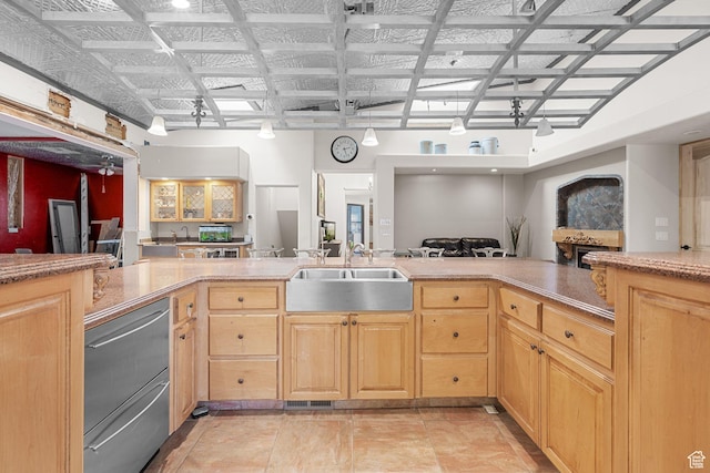 143 E 200 S, St George, UT 84770 - kitchen with light brown cabinetry, dishwasher, and open floor plan