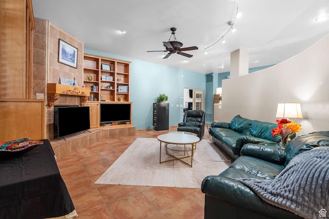 143 E 200 S, St George, UT 84770 - living area featuring ceiling fan, a fireplace, and light tile patterned floors