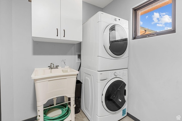 143 E 200 S, St George, UT 84770 - laundry room with stacked washer / dryer and cabinet space