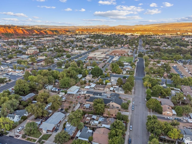 143 E 200 S, St George, UT 84770 - aerial view of property and surrounding area featuring nearby suburban area and mountains