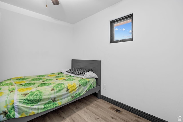 143 E 200 S, St George, UT 84770 - bedroom featuring wood finished floors and ceiling fan