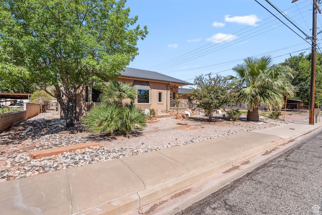 143 E 200 S, St George, UT 84770 - obstructed view of property featuring a metal roof